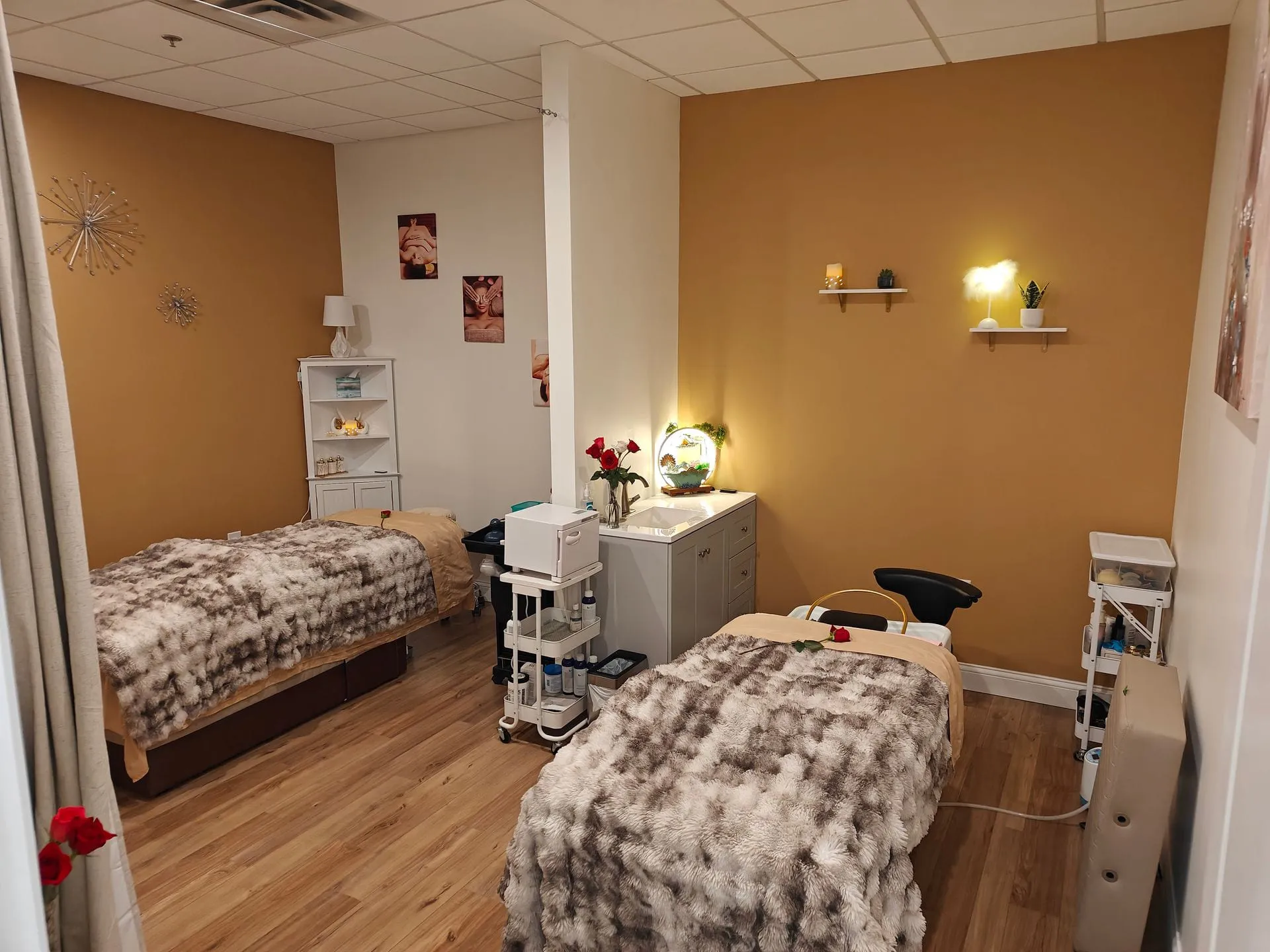 The joinable head spa room at Fiona's Day Spa, set with two treatment tables for guests from Andover, MN